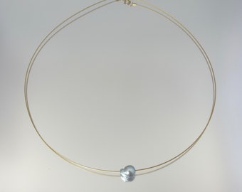 minimalist floating pearl necklace in sterling silver or gold featuring one of 11 different pearls to choose from