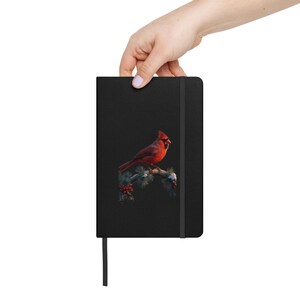 Winter Cardinal Notizblock – Eleganter roter Vogel auf Tannenzweig