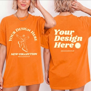 Peut inclure: T-shirt orange avec l'inscription "YOUR DESIGN HERE" et un dessin d'une personne sur le devant. Le dos du t-shirt porte également l'inscription "Your Design Here" avec un motif de soleil. Les mots "NEW COLLECTION" sont également imprimés sur le devant.