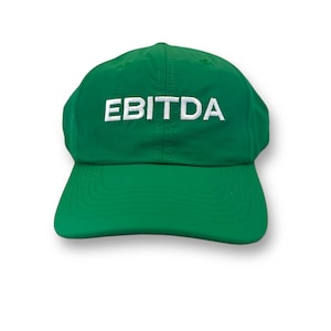 May include: A green baseball cap with the word "EBITDA" embroidered in white on the front.