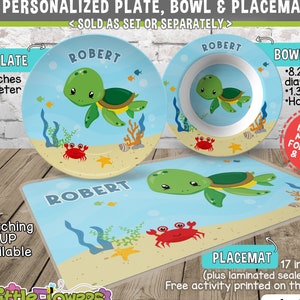 May include: Personalized children's dinnerware set with a sea turtle theme. The set includes a 10-inch plate, a bowl, and a 17 x 11 inch placemat. The placemat has a laminated sealed edge and a free activity printed on the back. The set is made of high-performance polymer, free of formaldehyde, BPAs and DEHPs. It is FDA and NSF approved for food contact and is microwave, oven and dishwasher safe.