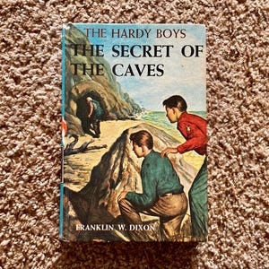 Vintage 1964 Hardy Boys: The Secret of the Caves Hardcover Book