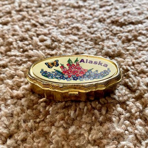 Vintage (1990s) Alaska Souvenir Floral Gold Hinged 2.25&quot; Pill Box Container | Vintage Pill Box [Pre-Owned]