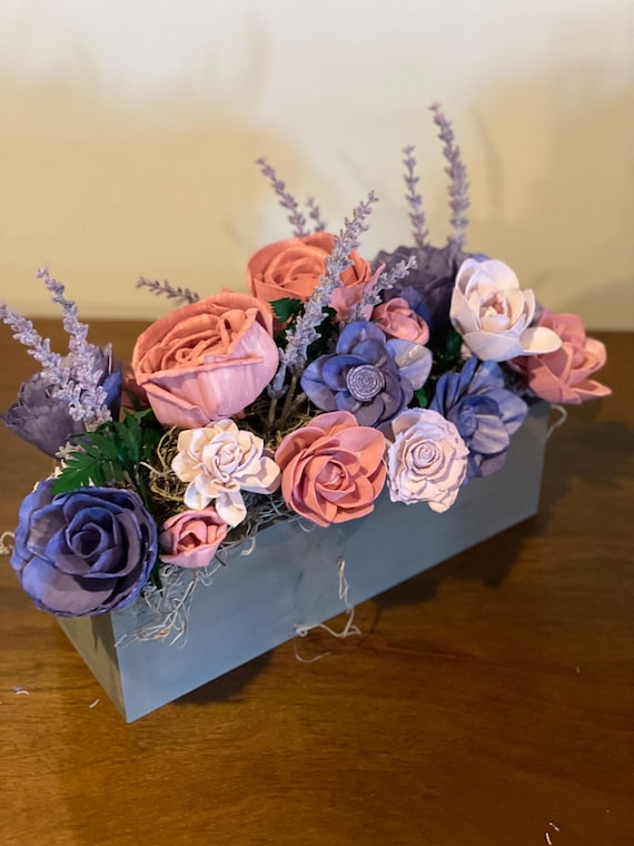 Brighten up your room with a beautiful sola wood flowers arrangement