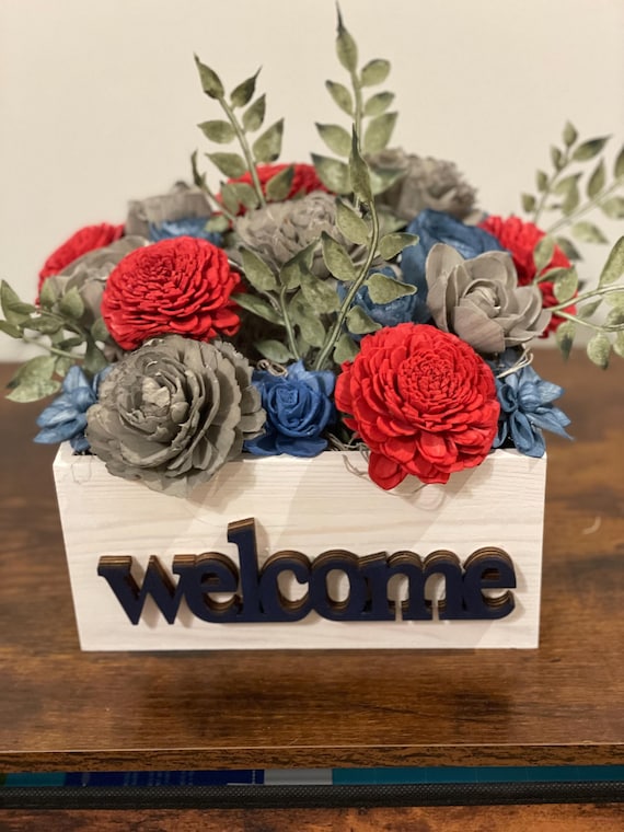 Vibrant sola wood hand dyed floral arrangement.