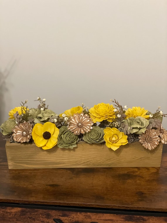 Vibrant yellow and green Sola Wood flowers
