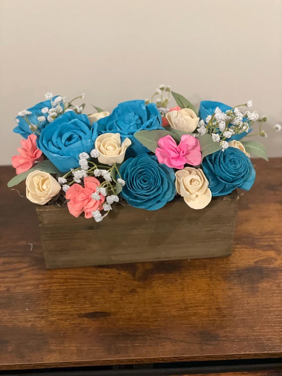 A touch of spring is in these hand dyed Sola wood flowers.