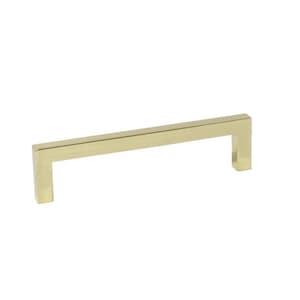 May include: A gold-toned cabinet pull with a rectangular shape. The pull has a smooth, polished finish.