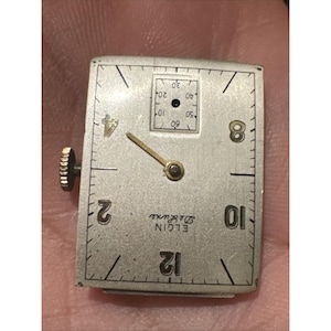 Movimento per orologio da polso vintage Elgin 558 - 17 rubini con quadrante e corona immagine 4