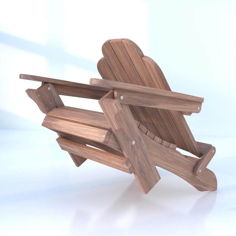 May include: A wooden adirondack chair with a natural wood finish. The chair is folded and tilted to the side, showing the details of the construction.