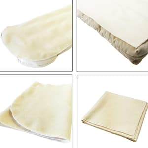 May include: A collection of four images showcasing cream-colored, soft, and absorbent cloth diaper inserts. The inserts are made of a thick, plush material, and are shown folded and in use, providing a glimpse of their structure and texture.