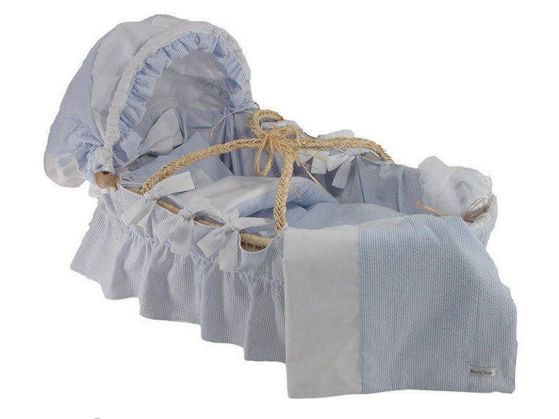 blue and grey moses basket