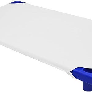 May include: A rectangular elevated cot featuring a bright blue plastic frame with four sturdy corner legs and a taut white fabric sleeping surface stretched across the top, designed with a low profile and rounded corners for stability and support.