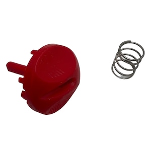 May include: A red plastic knob with a small hole and a metal spring. The knob has a small pin on the bottom.