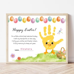 May include: A framed print with an Easter theme. The artwork features a yellow handprint transformed into a chick, with the text "Happy Easter!" and a poem. Colorful Easter eggs and a basket are also depicted.