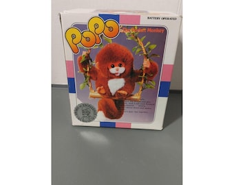 Vintage speelgoed 'Popo The Singing Pocket Monkey' uit 1983