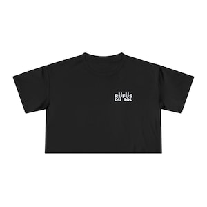 May include: Black cropped t-shirt with the text "RÜFÜS DU SOL" in white.