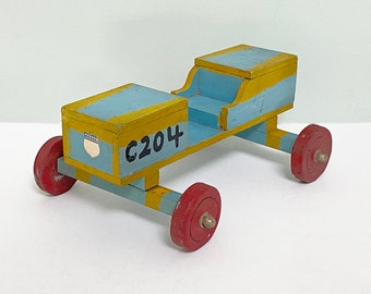 Vintage Handmade Primitive Wooden Toy Race Car with Blue and Yellow Paint & Red Wheels