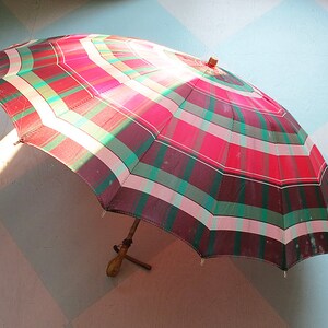 1930s Plaid Taffeta Parasol in Maroon, Pink and Green with an Amber Bakelite Handle and Tip
