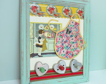 Mother's Little Helper – Framed Handmade One of a Kind Mixed Media Wall Art with Cookie Cutters, Mini Apron, Teacup Shelf Edging & More