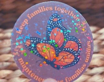 monarch butterfly "keep families together" sticker  |  english and spanish floral holographic sticker (CHIRLA collection)