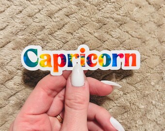 groovy tie-dye capricorn zodiac sticker  |  clear border rainbow astrological sign sticker