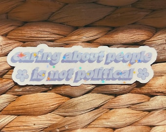 y2k "caring about people is not political" sticker  |  pink and purple holographic sticker (CHIRLA collection)
