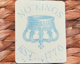 holographic "no kings est. 1776" sticker  |  activism sticker (CHIRLA collection)