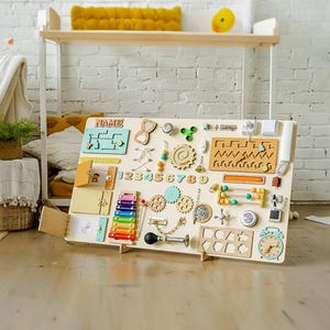 Tableau sensoriel Montessori, Tableau animé personnalisé, Tableau animé en bois pour jouer avec bébé, Jouet pour tout-petit, Cadeau de 1er anniversaire, Tableau d'activités pour l'apprentissage précoce