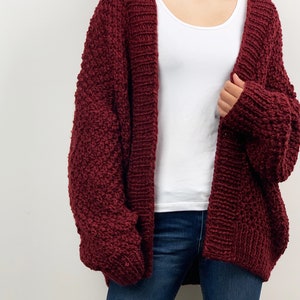 Hand knit oversize woman sweater chunky slouchy plum wool cardigan