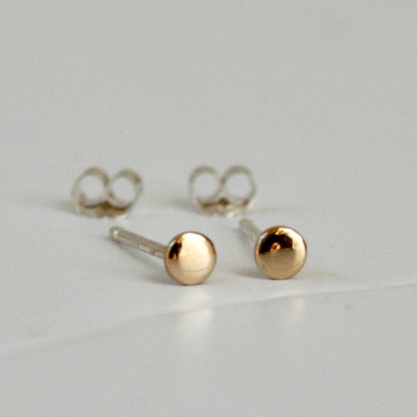 Tiny 3mm 14/20 yellow gold filled round dot stud earrings with polished finish and silver posts and backs