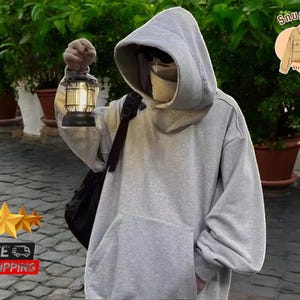 Oversized Hooded Sweatshirt | Youthful Stylish Pullover | Cozy Streetwear for Women | Comfortable Casual Hoodie | Unique Large Hood Design