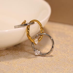 Anel de segmento articulado sem costura de aço inoxidável 16G com clicker, formato de coração, zircônia cúbica, septo, concha, cartilagem, piercing de nariz, anel de septo, joia de piercing de hélice