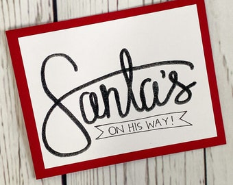 Hand Lettered Santa's on His way
