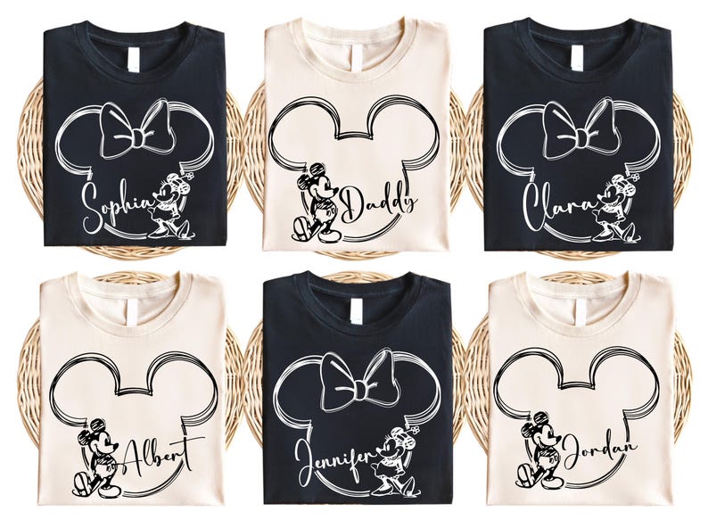 a set of four mickey mouse shirts
