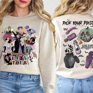 a woman wearing a sweater with a cartoon character on it