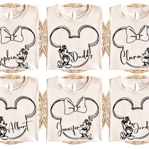 a set of six mickey mouse shirts