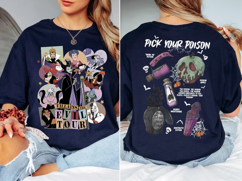 a woman sitting on top of a bed wearing a blue shirt