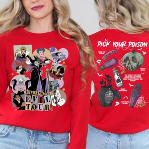 a woman wearing a red shirt with pictures on it