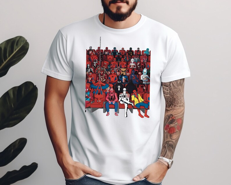 a man wearing a white t - shirt with a picture of a group of people
