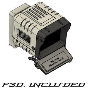 Puede incluir: Un teclado simulado impreso en 3D de color beige y negro con una tapa abatible que dice "Mock Keyboard" en la parte delantera. El texto "F3D. INCLUDED" está impreso debajo del teclado.