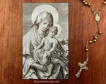 May include: A black and white vintage print of the Virgin Mary holding baby Jesus. The image is on a white card with the text "JMJPrintables.etsy.com" at the bottom.
