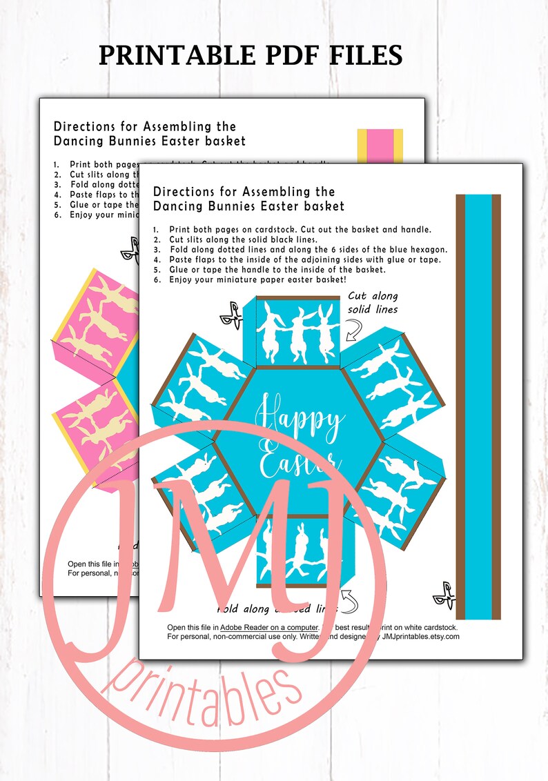 May include: Printable PDF file for a 3D paper Easter basket. The basket is blue with white bunnies dancing around it. The text "Happy Easter" is written on the front of the basket. The instructions for assembling the basket are included.