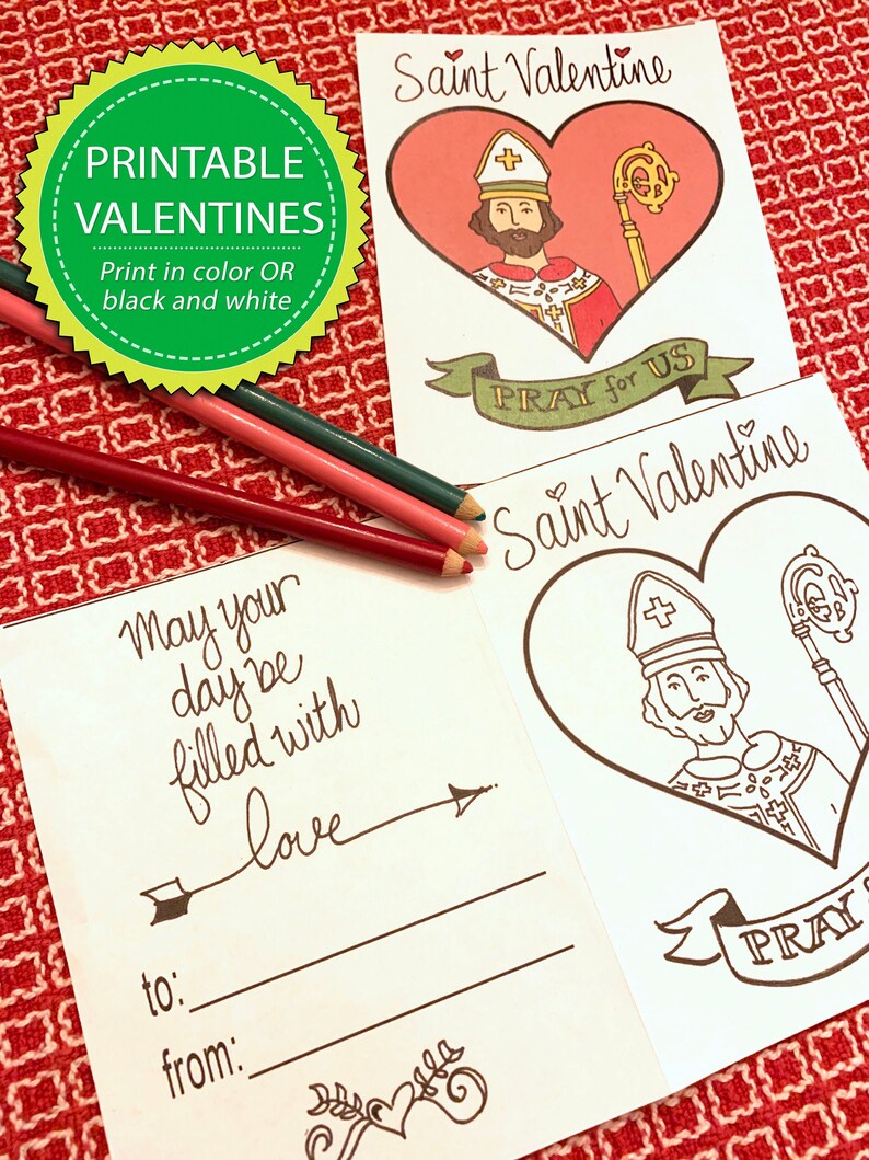 May include: Printable Valentine's Day cards featuring Saint Valentine with a heart and the text "Pray for Us". The cards are black and white and can be colored in.