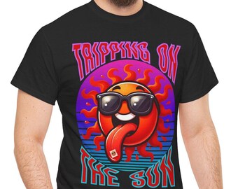 May include: Black t-shirt featuring a cartoon sun wearing sunglasses and sticking out its tongue. The text "Tripping on the Sun" is printed on the shirt.