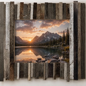 May include: A rectangular framed landscape photograph featuring a mountain range, lake, and sunset. The frame is constructed of weathered, reclaimed wood in shades of gray, brown, and white. The photograph captures the natural beauty of the scene.
