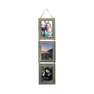May include: A rustic wood picture frame with three openings, each holding a different photograph. The frame is hanging from a beige ribbon and has a weathered gray finish.