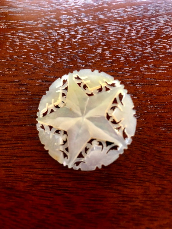 Mother of pearl star brooch