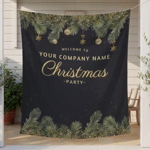 May include: A black fabric backdrop featuring a gold text design that reads WELCOME TO YOUR COMPANY NAME Christmas -PARTY-. The banner is decorated with green pine branches, gold ornaments, and gold snowflakes along the top and bottom edges.