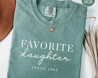 Favoriete shirt in comfortkleuren dochter: aanpasbaar geboortejaar